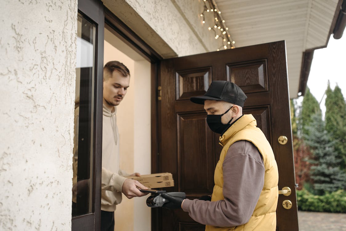 a person paying via phone